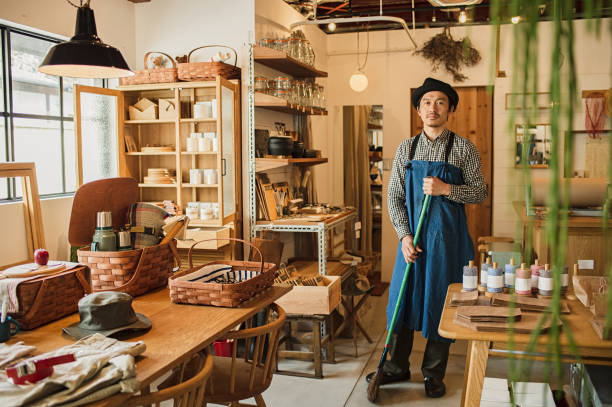 istock Male owner preparing to open store 674504200