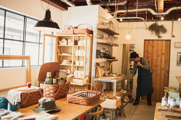 istock Male owner preparing to open store 674504202