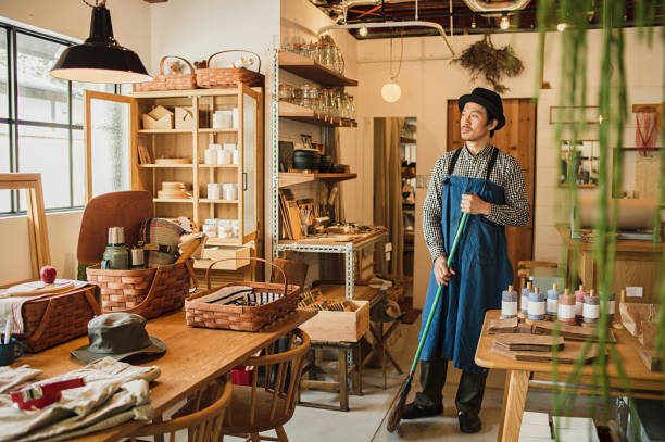 istock Male owner preparing to open store 674504214