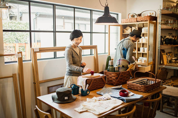 istock Two owners working together in general shop. 674504290
