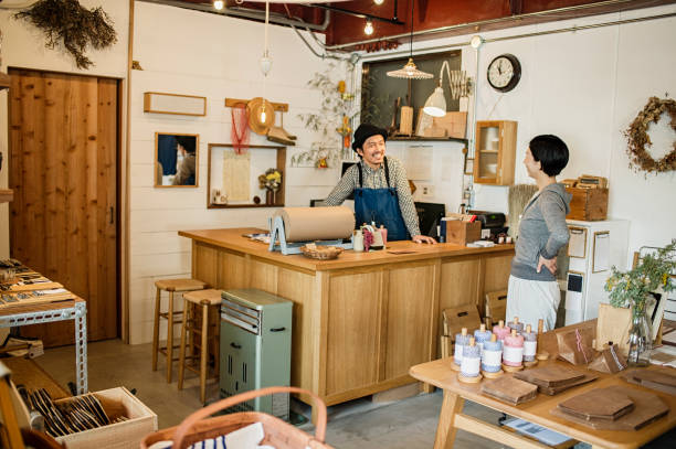 istock Two owners working together in general shop. 674504724