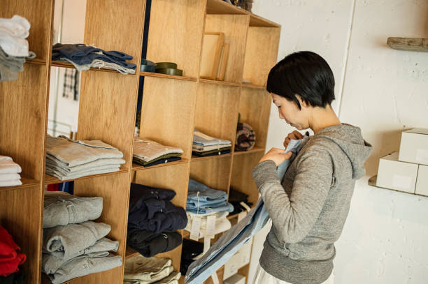 istock Female owner working in General shop. 674504734