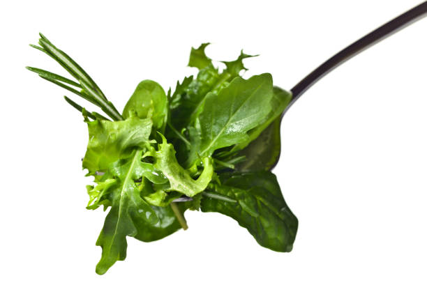 istock Fresh green salad isolated on white background 674528036