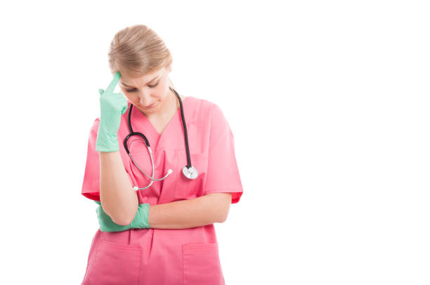 istock Female medical nurse making thinking gesture 674543420