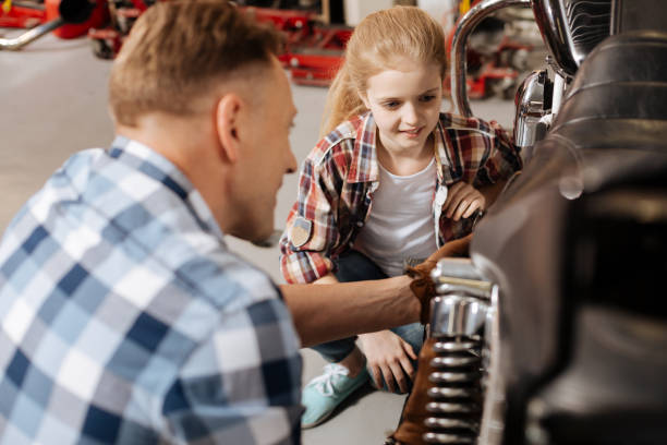 istock Brilliant eager child listening to dads lecture 674555510