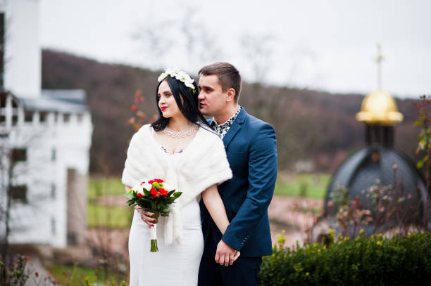 istock Graceful wedding couple background church 674559528