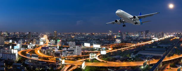 istock Airplane take off over the panorama city at twilight scene 674561242