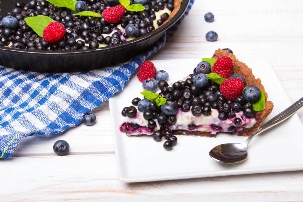 istock Delicious tart with blueberries and raspberries 674567312