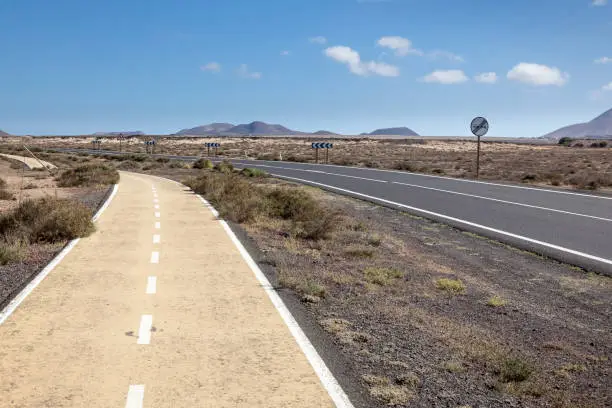 Road and bikepath outside La Oliva, the old capital of Fuerteventura. The area are trying to attract tourists with special bike routes