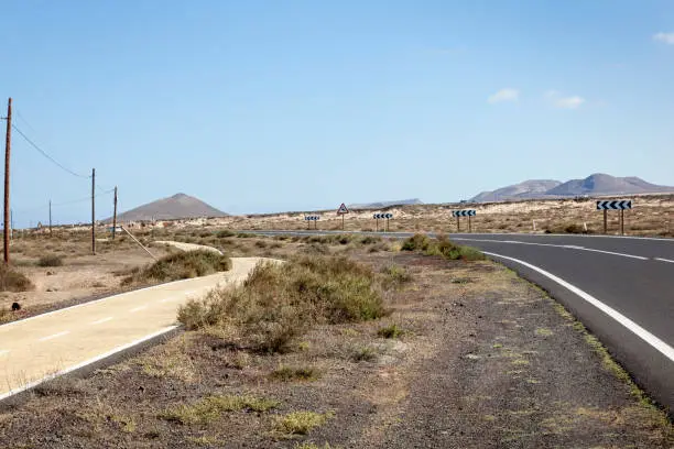 Road and bikepath outside La Oliva, the old capital of Fuerteventura. The area are trying to attract tourists with special bike routes