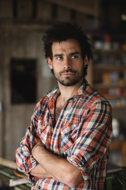istock Environmental portrait of a carpenter in his workshop 674571362