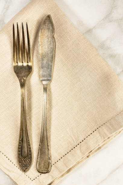 istock Overhead photo of vintage fork and knife with copyspace 674572116