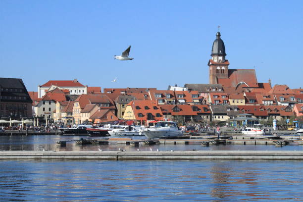 View of the old town in Waren (Müritz) Partial view of Waren with city harbour and St. Mary's Church muritz national park photos stock pictures, royalty-free photos & images