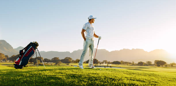 istock Professional male golfer on field 674575828