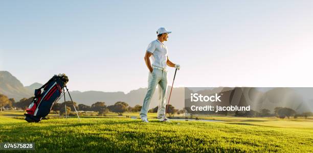 Professional Male Golfer On Field Stock Photo - Download Image Now - Golf, Golfer, Males