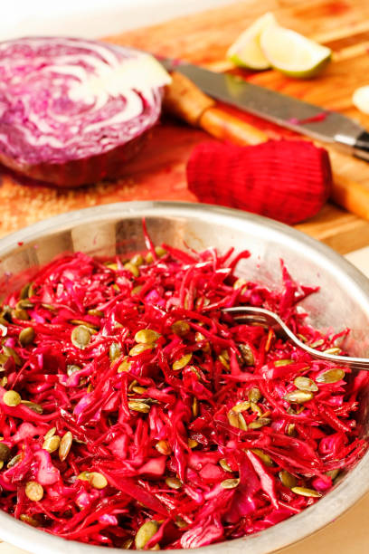 istock Red cabbage and beet salad with pumpkin seeds 674578462
