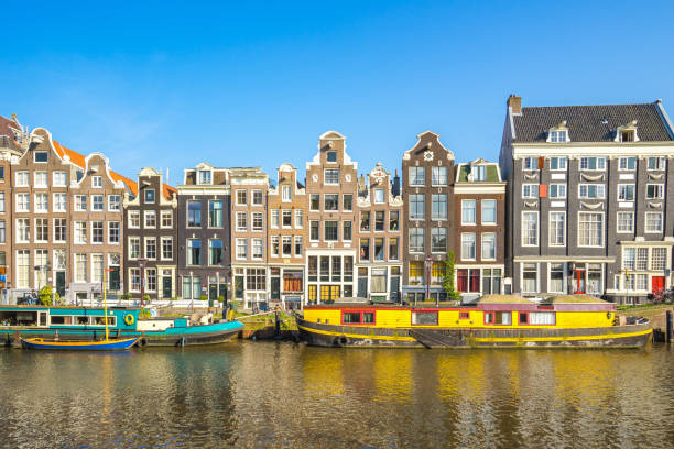istock Canal House in Amsterdam city, Netherlands 674581776