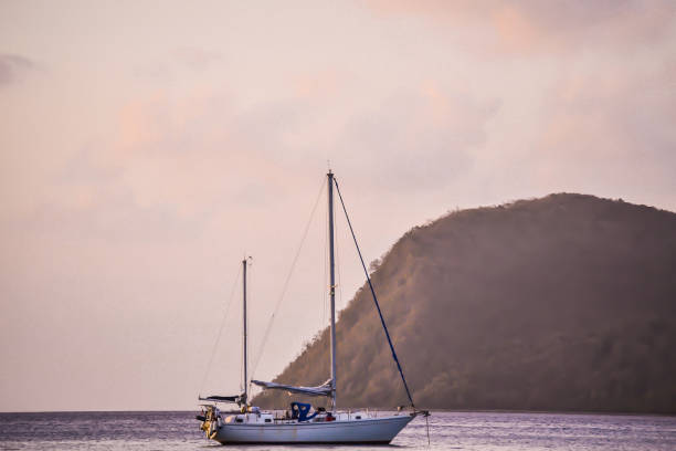 istock Silhouettes at Sunset in Dominica 674582796