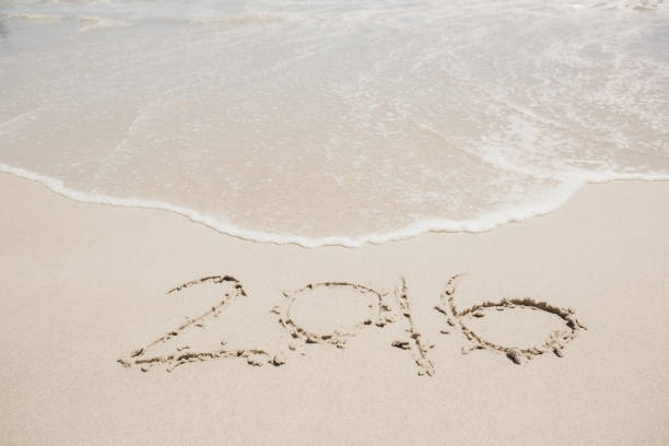 istock View of 2016 in sand 674585300