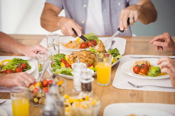 istock Midsection of family having breakfast 674586114