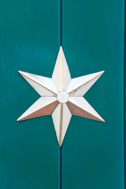 Star decoration hanging on the door of a retail outlet