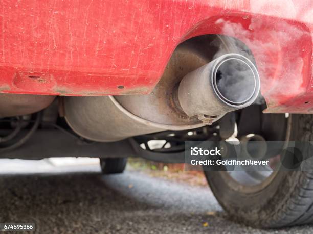 Diesel Exhaust Old Red Car Detail With Smoke Stock Photo - Download Image Now - Car, Fumes, Red