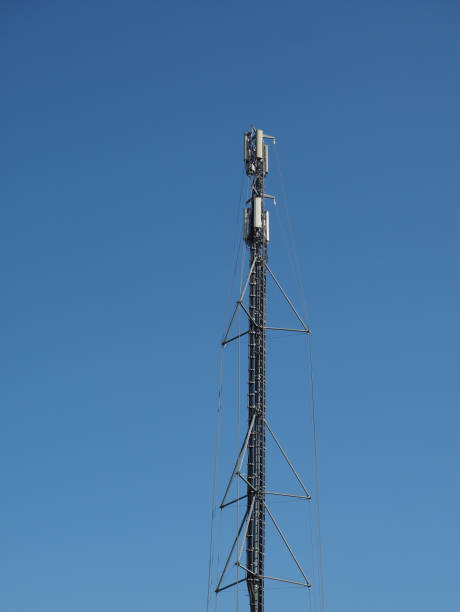 istock aerial antenna tower over blue sky 674595416