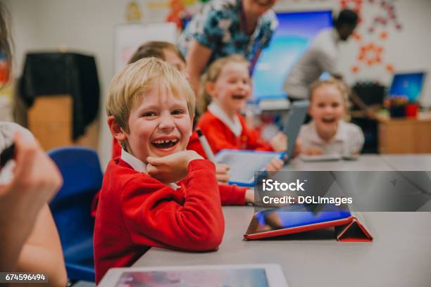 Happy Student In Technology Lesson Stock Photo - Download Image Now - Elementary Student, UK, Education