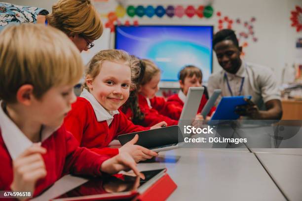 Happy Student In Technology Lesson Stock Photo - Download Image Now - Classroom, Education, Technology