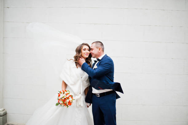 istock Wedding couple background white big wall 674596664