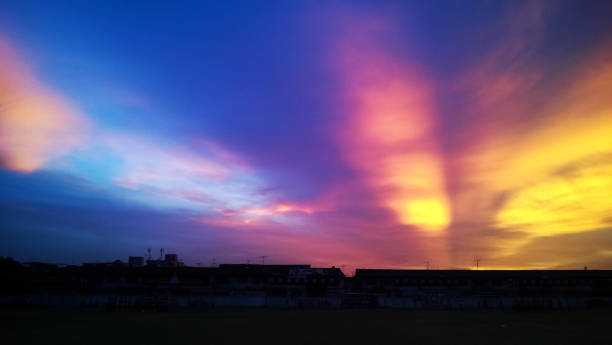 istock soccer field with colorful sky 674600480