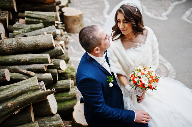 istock Wedding couple siitting background many stumps 674603150