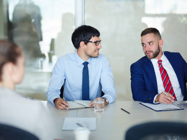 istock Business Colleagues Talking at Meeting Table 674603876