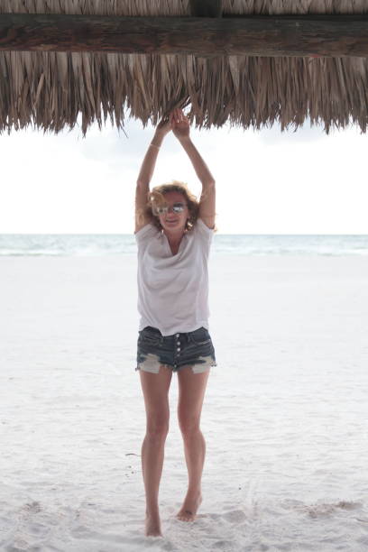 istock Woman on a beach. 674609024