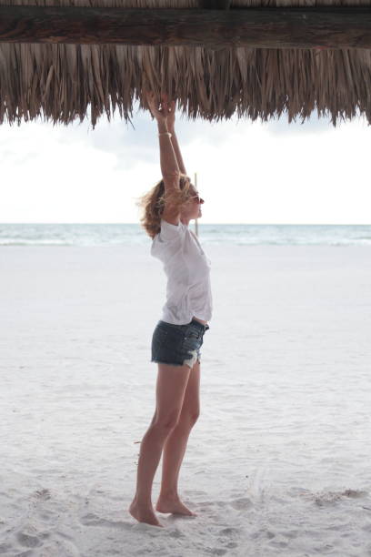 istock Woman on a beach. 674609026