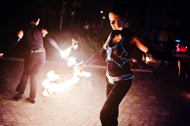 istock Presentable and awesome fire show at evening on wedding party.Photo with some noice 674609690