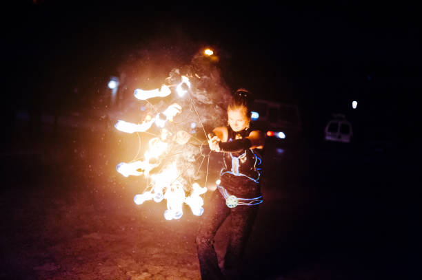 istock Presentable and awesome fire show at evening on wedding party.Photo with some noice 674609926