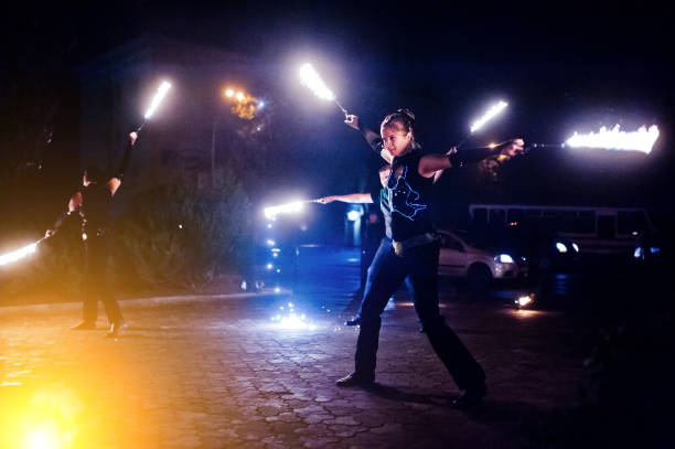 istock Presentable and awesome fire show at evening on wedding party.Photo with some noice 674610044
