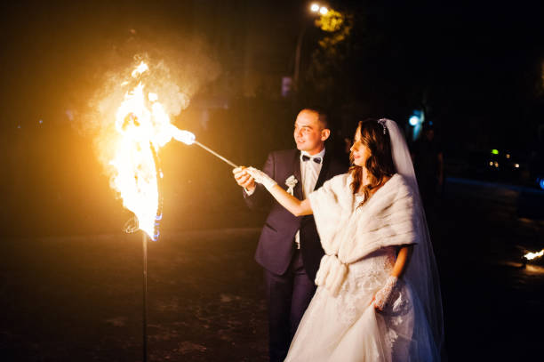 istock Wedding couple light fire heart  of love 674610304