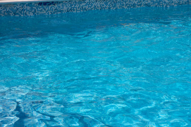 istock Blue clear water in the pool. Vacation 674627458
