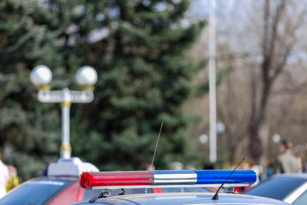 istock Police car parked at street 674630846