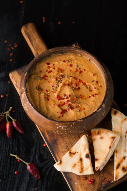 istock Hummus and pita bread and spices 674638588