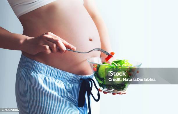 Healthy Nutrition And Pregnancy Stock Photo - Download Image Now - Pregnant, Vegetable, Cheerful