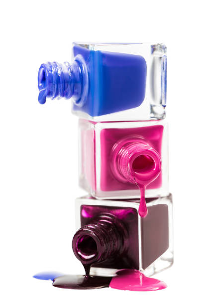 istock Stack of nail polish isolated on white background 674643300