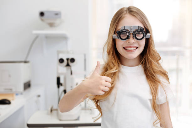 istock Cool positive girl trying different lenses 674646470