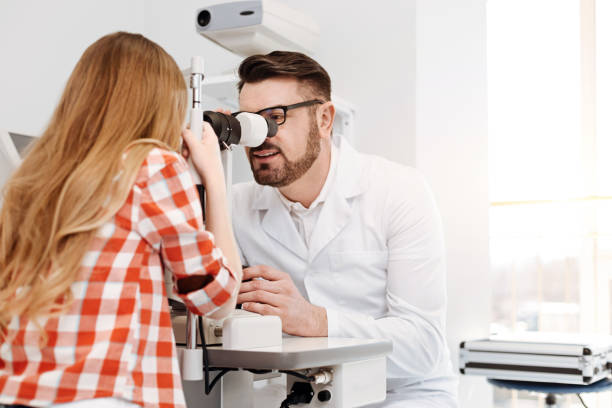 istock Private careful doctor employing professional opthalmometer 674646832