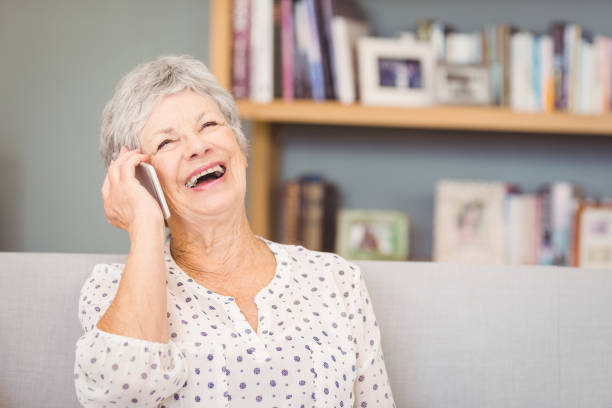 istock Senior woman talking on mobile phone 674656416