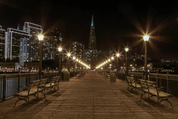 istock Beautiful pier in San Francisco at night with lights 674657230