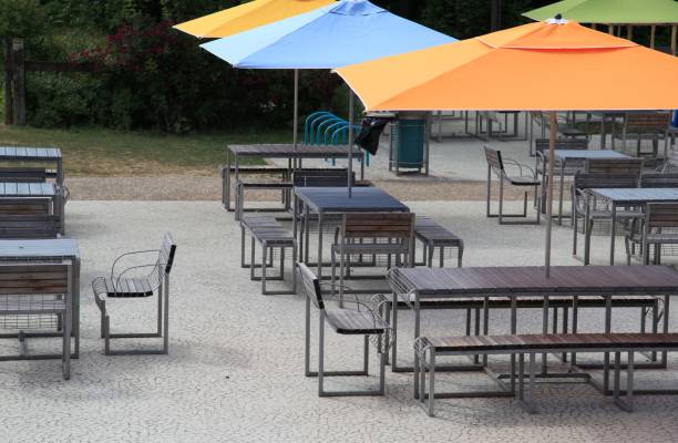istock Rest area and picnic - Bench table and parasol 674663452