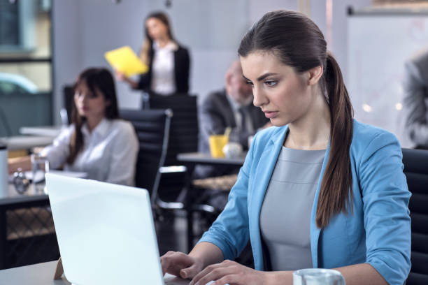 istock Hardworking women doing research on a laptop in an office 674671222